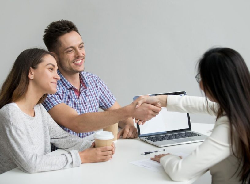 happy-couple-greeting-financial-consultant_1163-4739 happy-couple-greeting-financial-consultant_1163-4739